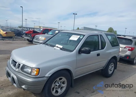 2002 Isuzu Rodeo Sport z USA, uszkodzony, nr VIN 4S2CK57D524319746